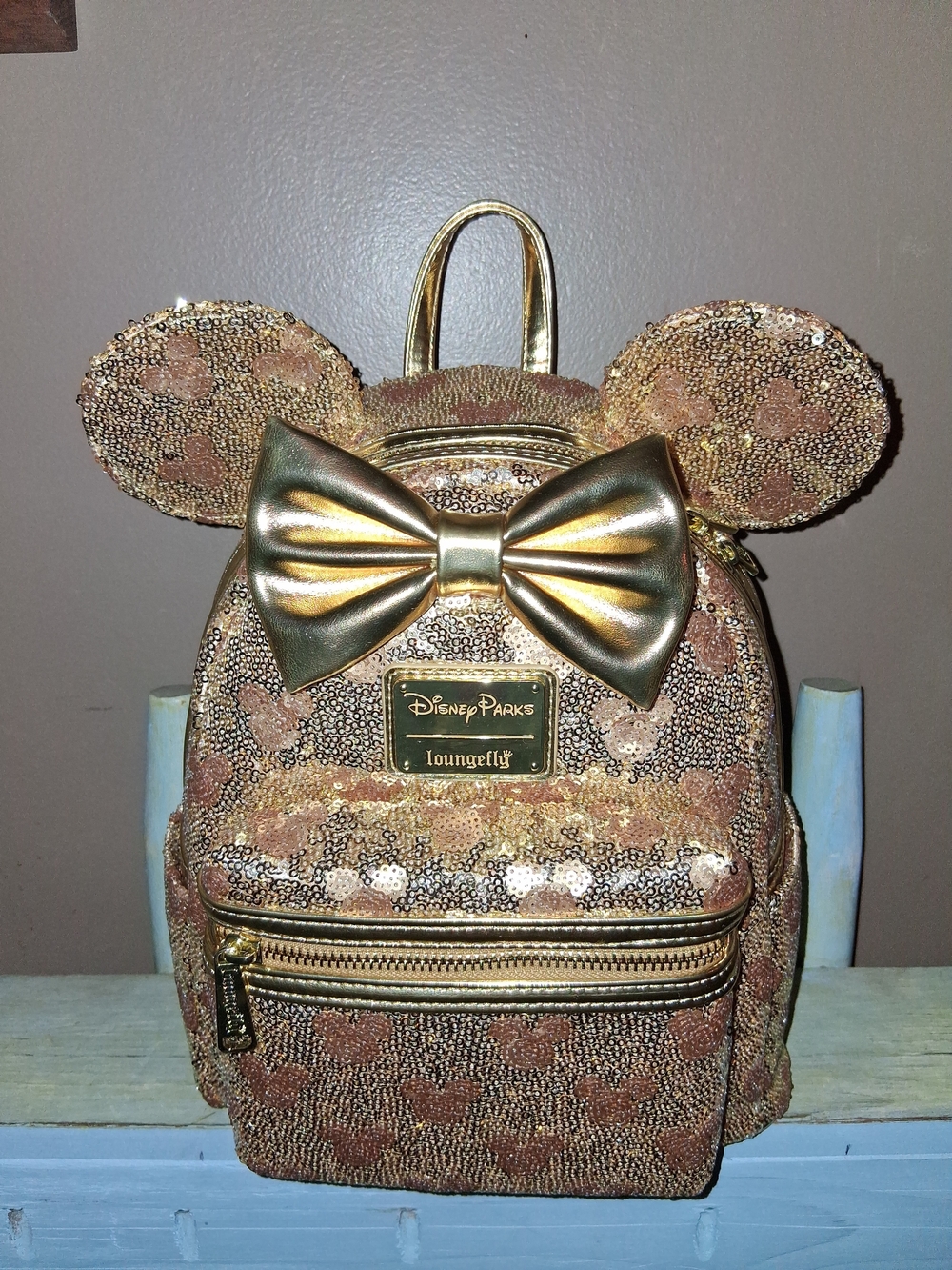 Loungefly Metallic Rose Gold Minnie Ear Sequin Mini Backpack with Gold Bow